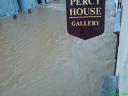 Looking out as the river  rises outside